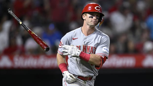 Aug 23, 2023; Anaheim, California, USA; Cincinnati Reds second baseman Matt McLain (9) tosses his bat after hitting a two-run home run against the Los Angeles Angels during the eighth inning at Angel Stadium. Mandatory Credit: Orlando Ramirez-USA TODAY Sports  